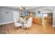 Cozy dining area with a glass table, stylish chairs, and ample lighting at 70 Lake Charles Xing, Covington, GA 30016