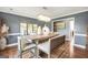 Dining area with wood floors, a table, 4 chairs and decor at 70 Lake Charles Xing, Covington, GA 30016