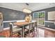 Dining room with table, 4 chairs, and a chandelier over the table at 70 Lake Charles Xing, Covington, GA 30016