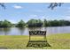 Bench overlooking tranquil lake and scenic views at 70 Lake Charles Xing, Covington, GA 30016