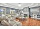 Inviting living room with a fireplace and lots of natural light at 70 Lake Charles Xing, Covington, GA 30016