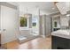 Luxurious bathroom featuring a soaking tub, walk-in shower, and backyard views at 159 Sims Rd, Tyrone, GA 30290