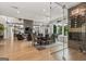 Open concept living, dining, and wine room showcases a modern design at 159 Sims Rd, Tyrone, GA 30290