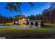 Modern home with a spacious driveway, and three-car garage at 159 Sims Rd, Tyrone, GA 30290