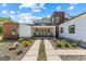 Stunning modern home with clean lines, stylish landscaping, and an elegant walkway to the entrance at 159 Sims Rd, Tyrone, GA 30290