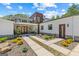 Inviting modern home with stone accents, manicured landscaping, and a stylish double-door entrance at 159 Sims Rd, Tyrone, GA 30290