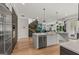 Kitchen boasts stainless steel appliances, a large center island, and lots of counter space at 159 Sims Rd, Tyrone, GA 30290