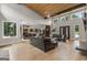 Open-concept living room shows modern design with wood accents and windows providing lots of natural light at 159 Sims Rd, Tyrone, GA 30290