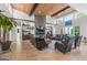 Spacious living room featuring modern decor, a stone fireplace, and access to the backyard at 159 Sims Rd, Tyrone, GA 30290