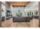 Bright living room with hardwood floors, fireplace, and views of the backyard at 159 Sims Rd, Tyrone, GA 30290