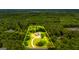 Acreage outlined of the secluded estate nestled in a lush green forest at 159 Sims Rd, Tyrone, GA 30290