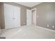 This carpeted bedroom features white trim, neutral paint, and natural light at 2180 Briarwood Ct, Villa Rica, GA 30180