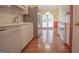 Well-equipped kitchen with modern appliances and hardwood floors, perfect for cooking and entertaining guests at 2180 Briarwood Ct, Villa Rica, GA 30180