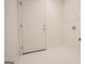 Bright laundry room with tile floors, a door to the exterior, and washer/dryer hookups at 2180 Briarwood Ct, Villa Rica, GA 30180