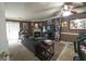 Living area featuring a fireplace, a ceiling fan, and comfortable seating at 3191 Kingswood Gln, Decatur, GA 30034