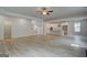 Bright open-concept living space features sleek floors, recessed lighting, and kitchen at 100 Bre Dr, Fayetteville, GA 30214
