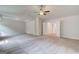 Large main bedroom with ceiling fan, connecting doors, gray carpet and recessed lighting at 100 Bre Dr, Fayetteville, GA 30214
