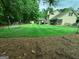 Lush backyard is perfect for games, relaxing, and enjoying outdoor living at 508 Caxton Ct, Peachtree City, GA 30269