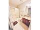 Bathroom with shower-tub, granite sink, and tiled flooring at 508 Caxton Ct, Peachtree City, GA 30269