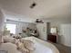 Spacious bedroom featuring carpet flooring, a ceiling fan, and a dresser at 508 Caxton Ct, Peachtree City, GA 30269