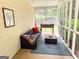 Comfortable screened-in porch with outdoor furniture, providing a relaxing outdoor living space at 508 Caxton Ct, Peachtree City, GA 30269