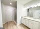 This bathroom features double vanity, modern fixtures, neutral tones, and ample counter space at 5096 Cumberland Ct # 96, Villa Rica, GA 30180