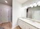 This bathroom features double vanity, modern fixtures, neutral tones, and ample counter space at 5096 Cumberland Ct # 96, Villa Rica, GA 30180