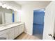 Bathroom featuring double sinks, granite countertops and wood flooring at 5096 Cumberland Ct # 96, Villa Rica, GA 30180
