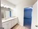Bathroom featuring double sinks, granite countertops and wood flooring at 5096 Cumberland Ct # 96, Villa Rica, GA 30180