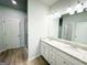 This bathroom features double vanity, modern fixtures, neutral tones, and ample counter space at 5096 Cumberland Ct # 96, Villa Rica, GA 30180