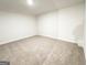 This spacious bedroom features neutral walls, plush carpet, and ample natural light, a serene retreat at 5096 Cumberland Ct # 96, Villa Rica, GA 30180