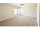 Spacious bedroom featuring a ceiling fan, two windows, carpet flooring and a neutral color palette at 5096 Cumberland Ct # 96, Villa Rica, GA 30180