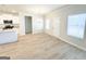 Spacious dining area features an elegant chandelier and natural light, flowing to kitchen at 5096 Cumberland Ct # 96, Villa Rica, GA 30180