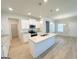 Modern kitchen features stainless steel appliances, granite countertops, and white cabinetry at 5096 Cumberland Ct # 96, Villa Rica, GA 30180