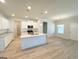 Spacious kitchen features white cabinets, granite countertops, and stainless steel appliances at 5096 Cumberland Ct # 96, Villa Rica, GA 30180