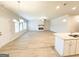 Spacious living area features an electric fireplace, wood floors, and great natural light at 5096 Cumberland Ct # 96, Villa Rica, GA 30180