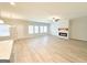Open-concept living room features modern fireplace, light floors, and ample natural light at 5096 Cumberland Ct # 96, Villa Rica, GA 30180