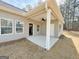 Cozy covered patio with a ceiling fan, perfect for relaxing outdoors at 5096 Cumberland Ct # 96, Villa Rica, GA 30180