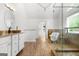 Bright bathroom boasts a vanity, soaking tub and glass shower at 150 Rockspray Rdg, Peachtree City, GA 30269