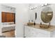 Bathroom showcasing granite countertop double sinks and natural lighting at 150 Rockspray Rdg, Peachtree City, GA 30269