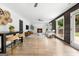 Beautiful living room with fireplace, wood accent wall, modern furniture, and lots of natural light at 150 Rockspray Rdg, Peachtree City, GA 30269