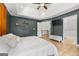 Large main bedroom showcases high ceiling, wood floors, and entry to ensuite bath and hallway at 150 Rockspray Rdg, Peachtree City, GA 30269
