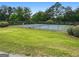 Well-maintained tennis courts surrounded by lush greenery, providing a perfect spot for recreation and sports activities at 150 Rockspray Rdg, Peachtree City, GA 30269