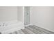 Bathroom with a bathtub and a glass shower at 281 Limestone Circle, Conyers, GA 30013