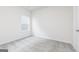 Cozy bedroom with neutral carpet and a window at 281 Limestone Circle, Conyers, GA 30013