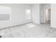 Bright and airy bedroom with neutral carpet, two windows, and white trim at 281 Limestone Circle, Conyers, GA 30013