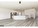 Open-concept living space with stainless steel appliances, and granite countertops at 281 Limestone Circle, Conyers, GA 30013