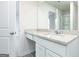 Bright bathroom with granite counters and white cabinets at 102 Avondale Blvd, Conyers, GA 30013