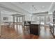 A spacious basement features a kitchenette, island seating, and french doors at 602 Embassy Ct, Peachtree City, GA 30269