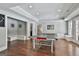 Finished basement featuring a ping pong table, recessed lighting, and custom built-in bench seating along the walls at 602 Embassy Ct, Peachtree City, GA 30269